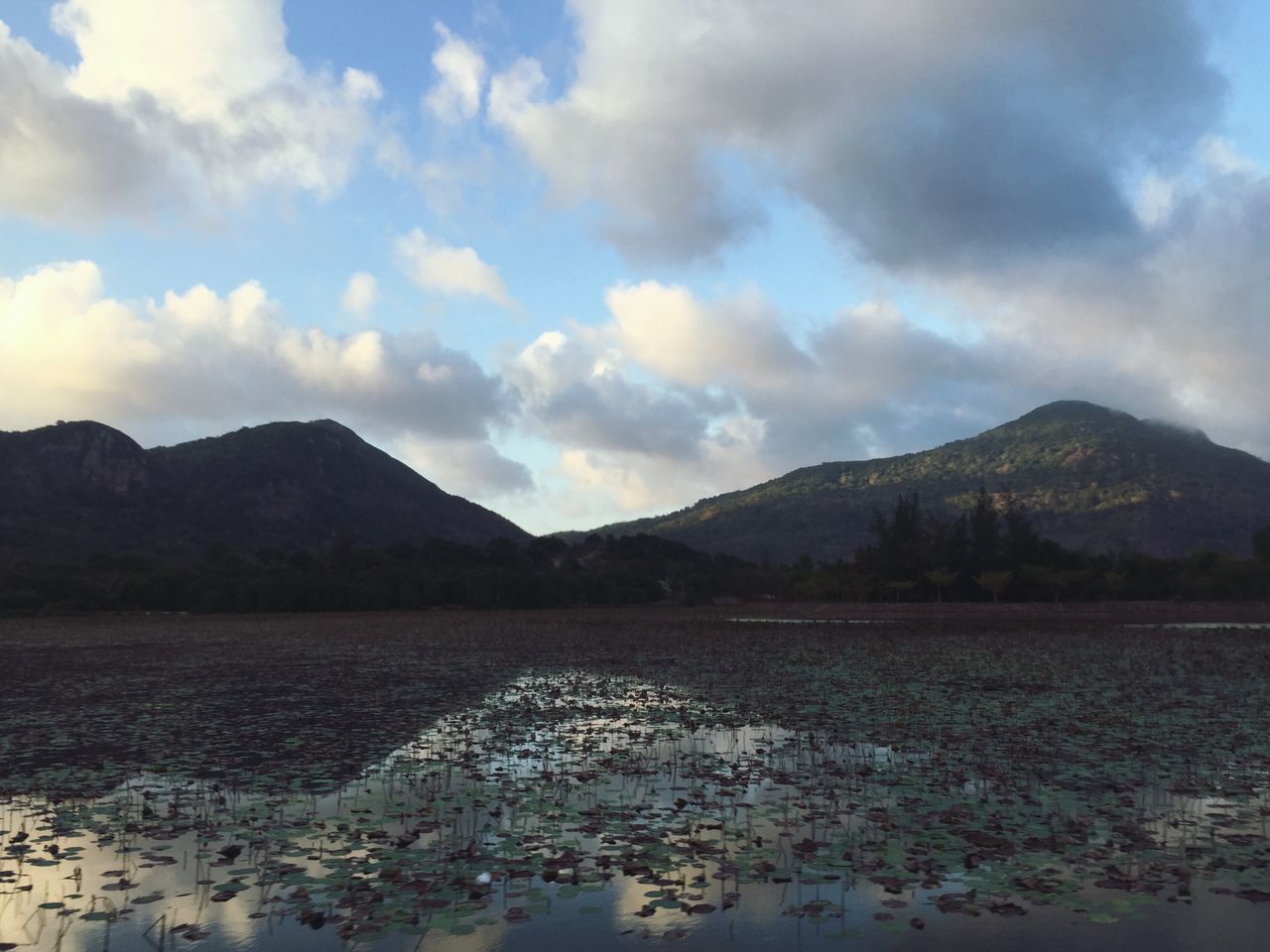 mountain, mountain range, sky, tranquil scene, tranquility, scenics, cloud - sky, landscape, beauty in nature, nature, cloud, cloudy, non-urban scene, idyllic, outdoors, remote, no people, day, lake, water