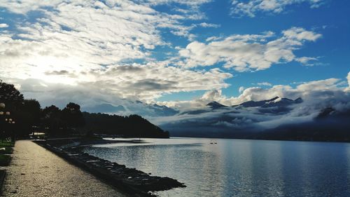 View of calm sea against cloudy sky