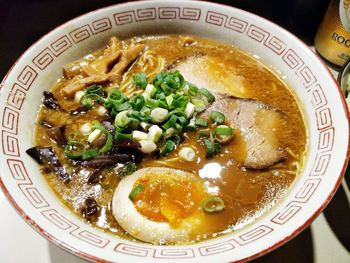 Close-up of soup served on table