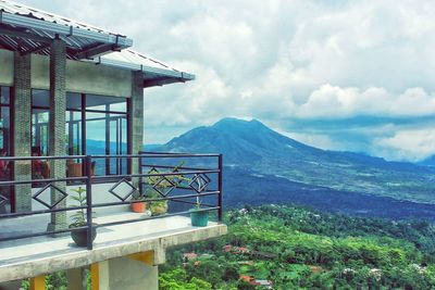 View of mountain range against cloudy sky