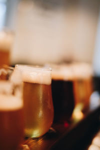 Close-up of beer glass on table