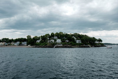 Scenic view of sea against cloudy sky