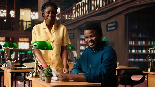 Side view of woman sitting at restaurant
