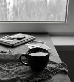 Close-up of coffee cup on table