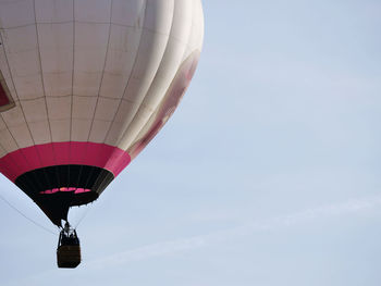 Low angle view of hot air balloon flying in sky