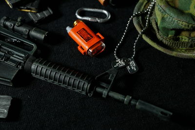 High angle view of ammunitions and hat on table