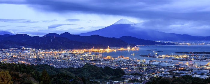 High angle view of city by sea and fuji mountain backgrounds 