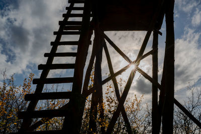 Low angle view of old tower against sky