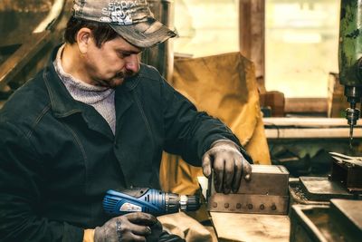 Man working on metal