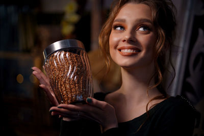 Girl with a can of buckwheat