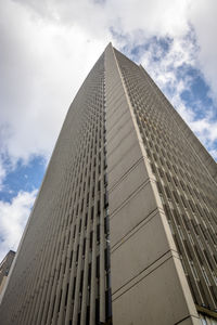 Low angle view of skyscraper against sky