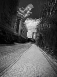 Road in city against sky