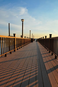 Pier over sea against sky