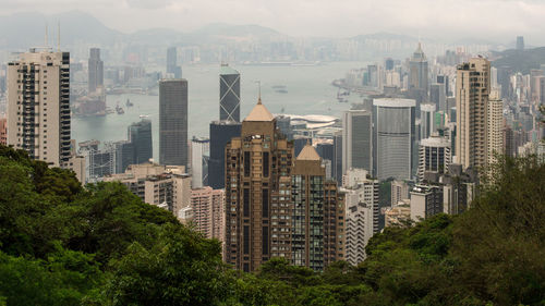 Buildings in city against sky