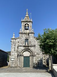 Low angle view of historic building against clear sky