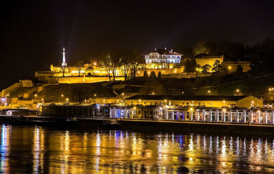 Illuminated buildings in city at night