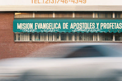 Information sign on road in city