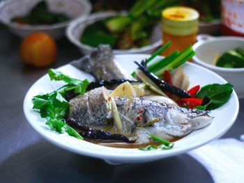 Close-up of fish on plate on table