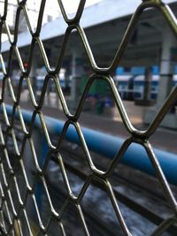 Railroad station seen through train window