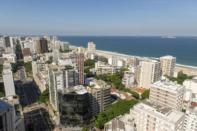 High angle view of buildings in city against sky