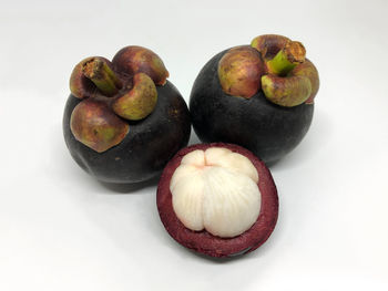 High angle view of fruits on white background