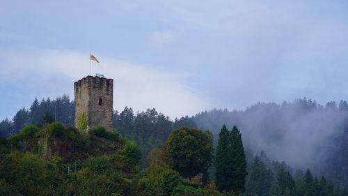 Old ruin tower with morning fog