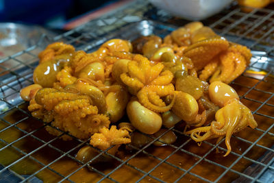 Close-up of meat on barbecue grill