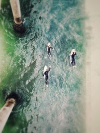 High angle view of people in sea