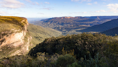 Panoramic view of landscape against cloudy sky