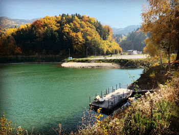 Scenic view of lake against sky during autumn