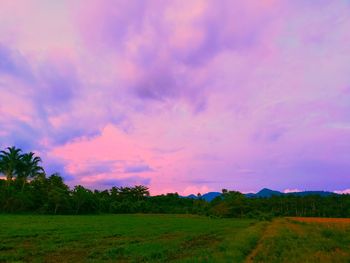Scenic view of landscape against sky during sunset