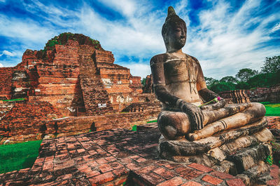 Statue of temple against sky