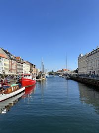 Boats moored in sea