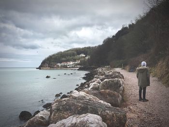 Scenic view of sea against cloudy sky