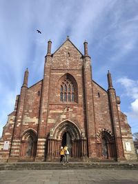 Low angle view of kirkwall cathedral against sky in orkney