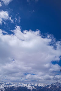 Low angle view of clouds against blue sky