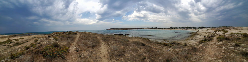 Panoramic view of beach against sky