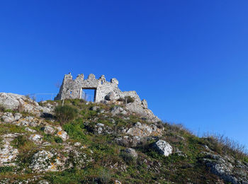 View of the fortress of tolfa, a beautiful lazio village in italy