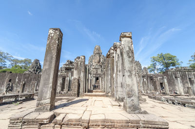 Old ruins of temple against blue sky