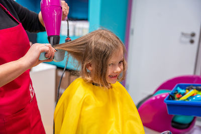 Rear view of woman with hands