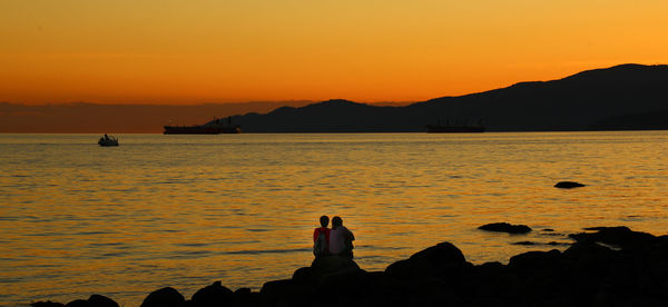 Scenic view of sea at sunset