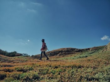 Walking under the blue sky