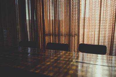 Close-up of chair on table at home