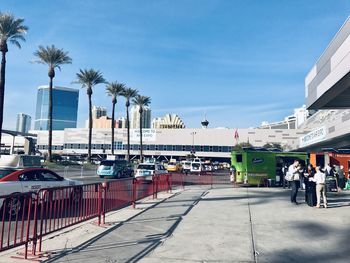 Panoramic view of people on street in city