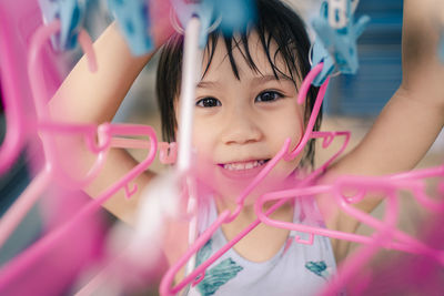 Close-up portrait of smiling girl