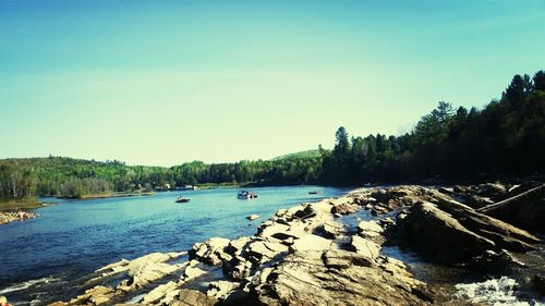 Scenic view of sea against clear blue sky