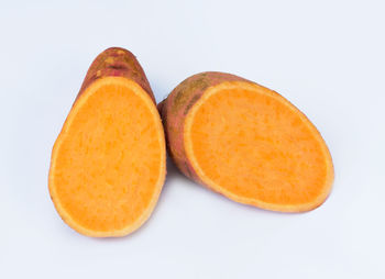 Close-up of bread against white background