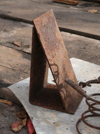 High angle view of rusty metal on table