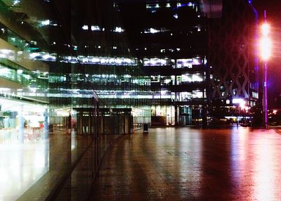 Empty illuminated building at night