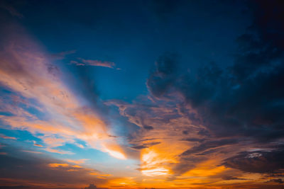 Low angle view of dramatic sky during sunset